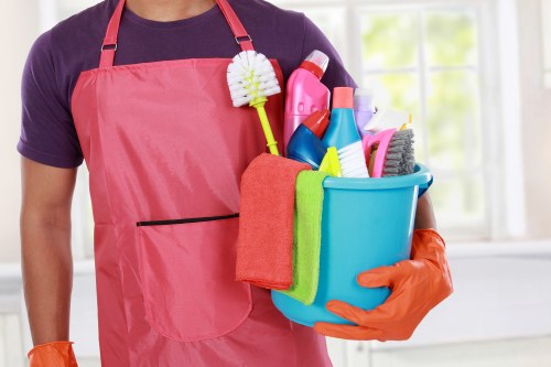 Commercial cleaner working in a Bow office entrance