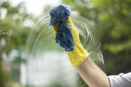 Exterior façade cleaning equipment and protected building frontage in Bow