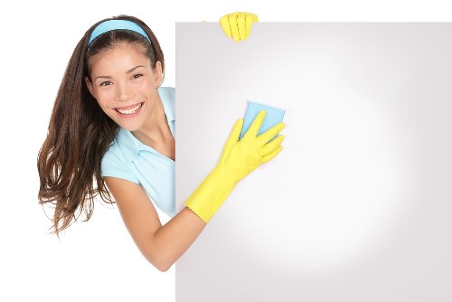 Local cleaners working in a Bow flat with attention to detail