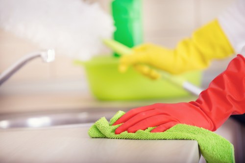 Local short-let cleaner preparing a Bow apartment for the next guest